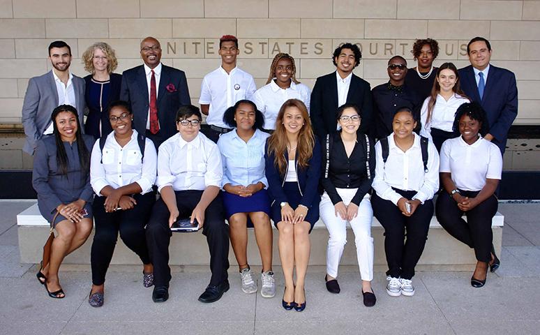 Cuauhtemoc Ortega (back-right) and federal defender staff coached the 2018 Dorsey High School mock trial team, helping them prepare for competition against other schools and answer questions about the law.