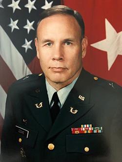 John S. Cooke retired as a brigadier general in the Army JAG Corps.