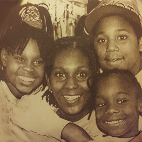 A young Taisha Sturdivant (below right) with her mother Liz; sister Jessica; and brother Kareem.