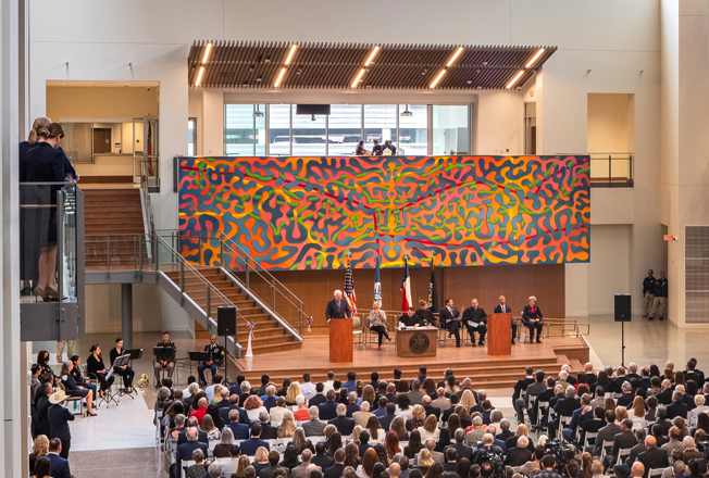 A vibrant mural serves as a visual focal point for the courthouse atrium. The title Riparian Nexus means a “network of waterways,” inspired by the local landscape.
